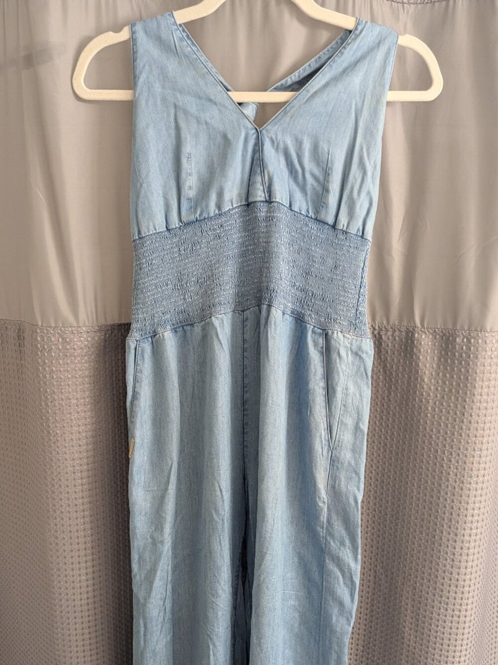 GUESS Light Wash Chambray Smocked Open-Back Jumpsuit